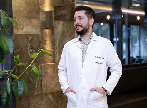 Dr. Mert Canli